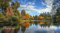 Tranquil Autumn Lake with Vibrant Foliage and Reflections