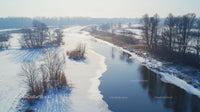 Aerial View of Serene Snow-Covered Winter Landscape