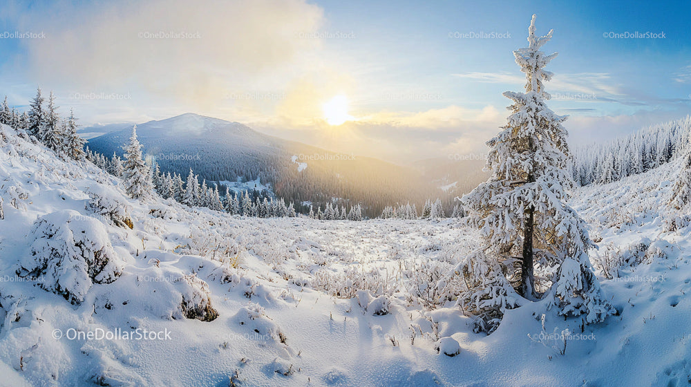 Stunning Winter Sunrise Over Snow-Covered Mountain Landscape