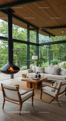 Modern Living Room with Fireplace and Glass Walls Overlooking Woods