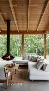 Modern Living Room with Fireplace and Scenic Forest View