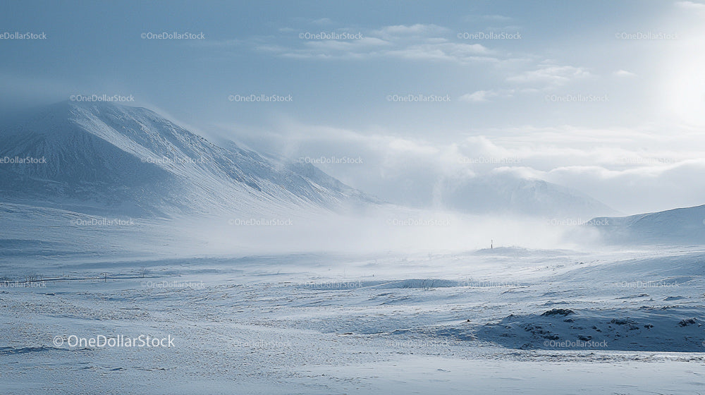 Snowy Mountain Landscape with Mist and Snow-Covered Peaks