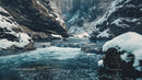 Serene Winter River Flowing Through Snowy Mountain Scenery