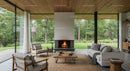 Modern Living Room with Fireplace and Expansive Glass Walls