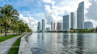Modern Skyline with High-Rise Buildings and Riverside Promenade