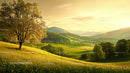 Golden Sunset Over Lush Green Hills and Lone Tree