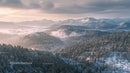 Snow-Covered Mountains and Misty Forest at Sunrise