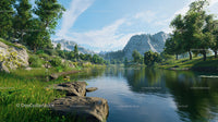 Scenic Mountain Lake with Lush Greenery and Clear Blue Sky
