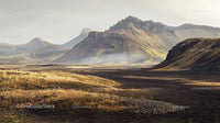 Misty Mountain Landscape with Diverse Geological Formations