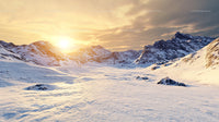 Snowy Mountain Range at Sunset with Icy Peaks