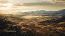 Golden Hour View Over Misty Valley and Rolling Hills