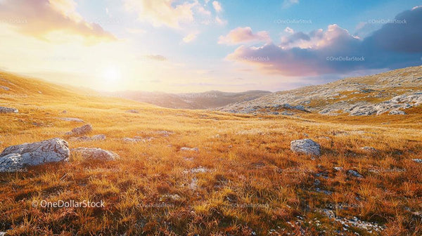 Golden Hour Over Rocky Terrain During Sunset