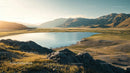 Golden Hour over Serene Lake and Majestic Mountains