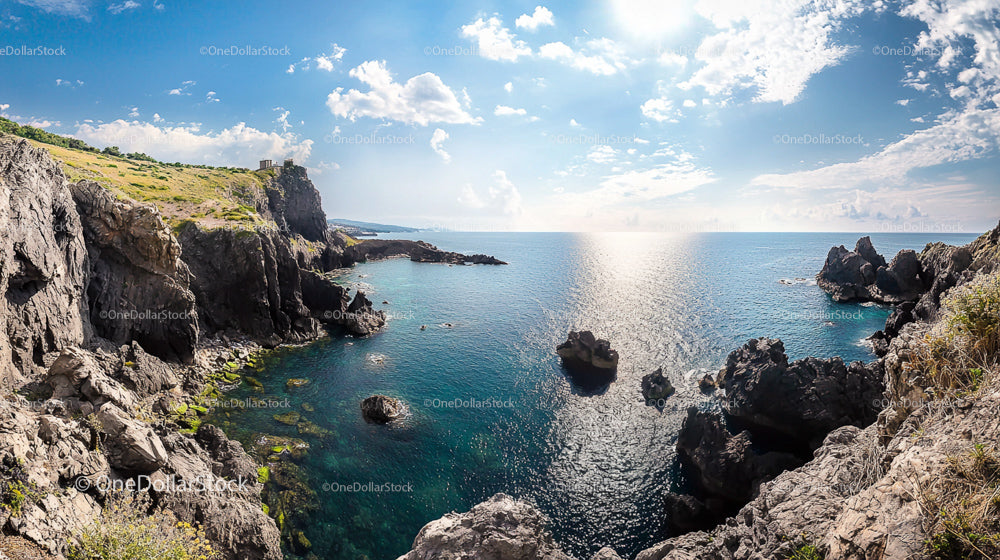 Breathtaking Rocky Coastline with Azure Waters and Cliffs