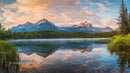Majestic Mountain Reflections at Sunrise Over Serene Lake