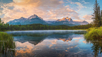Majestic Mountain Reflections at Sunrise Over Serene Lake