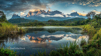 Majestic Mountain Reflections Over Serene Lake at Dusk