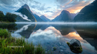 Misty Morning Reflections in a Serene Mountain Lake