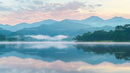 Misty Morning Reflection Over Tranquil Mountain Lake