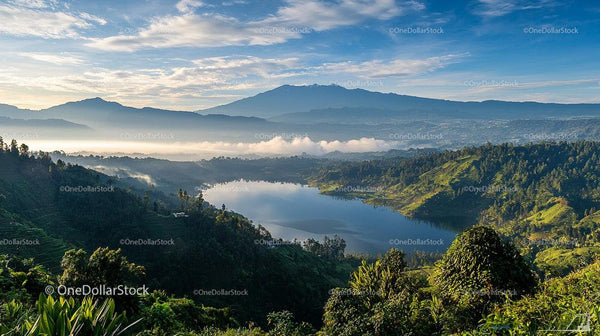 Stunning Mountain Lake Surrounded by Verdant Hills at Dawn