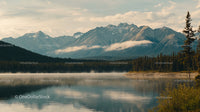 Breathtaking Mountain View Over Misty Lake at Dawn