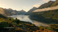 Tranquil Lake and Majestic Mountains at Sunset