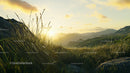 Sunset Over Serene Grassy Meadow and Rolling Hills