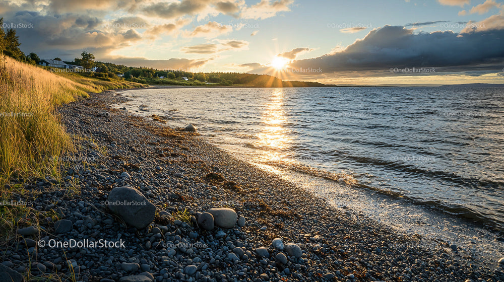 Serene Sunset Over Rocky Coastal Shoreline