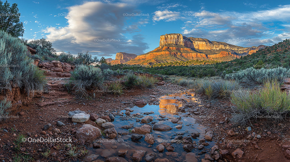 Stunning Desert Canyon with Rocky Stream and Blue Skies