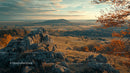 Golden Hour Over Autumn Landscape with Rolling Hills