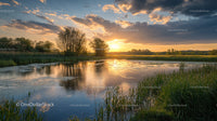 Serene Sunset Over a Tranquil Lake with Reflective Waters