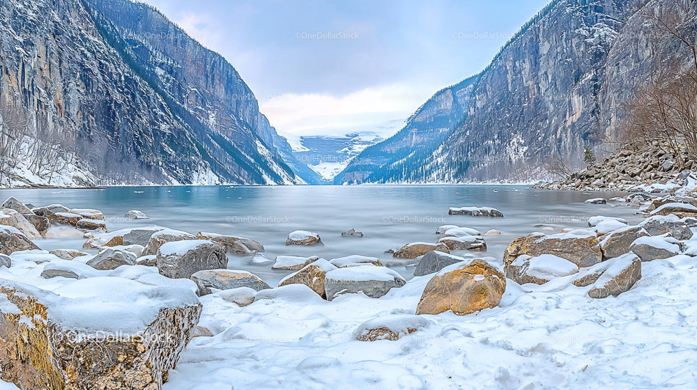 Stunning Snow-Covered Mountains with Frozen Lake View