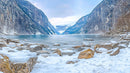 Stunning Snow-Covered Mountains with Frozen Lake View