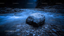 Serene Blue River with Prominent Rock in Mystical Night