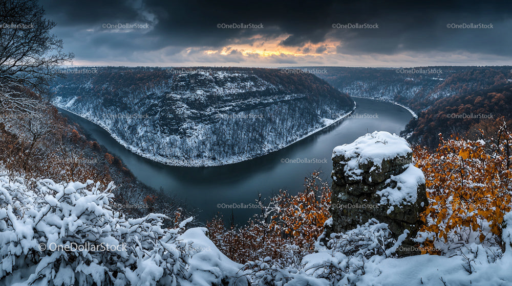 Dramatic Winter Landscape with Snow and Sunset Over River