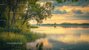 Tranquil Lake Scene with Golden Sunset and Lush Trees