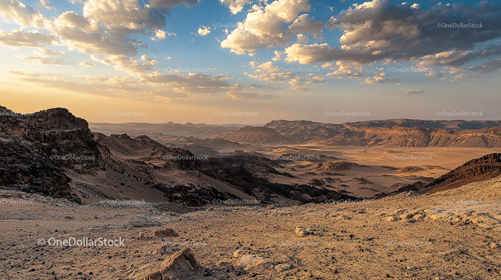 Golden Gold Landscape with Rolling Hills and Majestic Skies