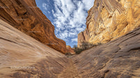 Sandstone Cliffs Under a Vibrant Blue Sky
