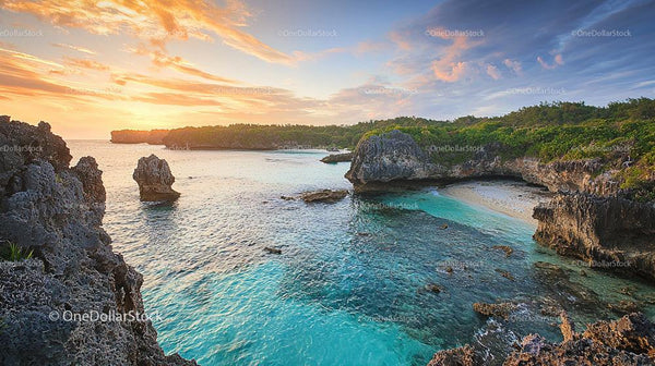 Tranquil Tropical Beach at Sunset with Turquoise Waters