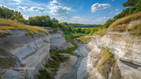 Stunning Summer Canyon with Lush Greenery and White Cliffs