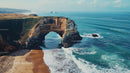 Scenic View of Coastal Arch and Turquoise Ocean Waves