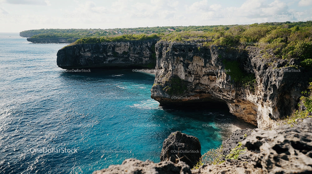 Tropical Coastal Cliffs and Deep Blue Ocean View