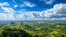 Breathtaking View of Lush Tropical Hills and Blue Sky