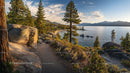 Sunset Over Rocky Shoreline and Pine Trees by a Tranquil Lake