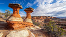 Majestic Sandstone Hoodoos in Arid Desert Landscape