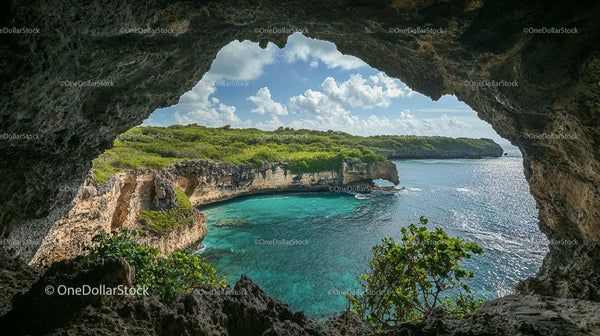 Scenic Ocean View Through a Rocky Coastal Cave