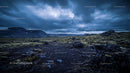 Moody Volcanic Landscape Under Dramatic Overcast Sky