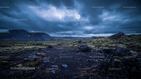 Moody Volcanic Landscape Under Dramatic Overcast Sky