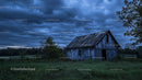 Rustic Barn Under Dramatic Stormy Skies