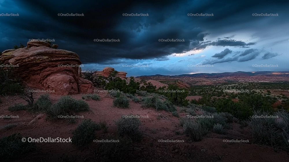 Dramatic Storm Clouds Over Desert Canyon Landscape